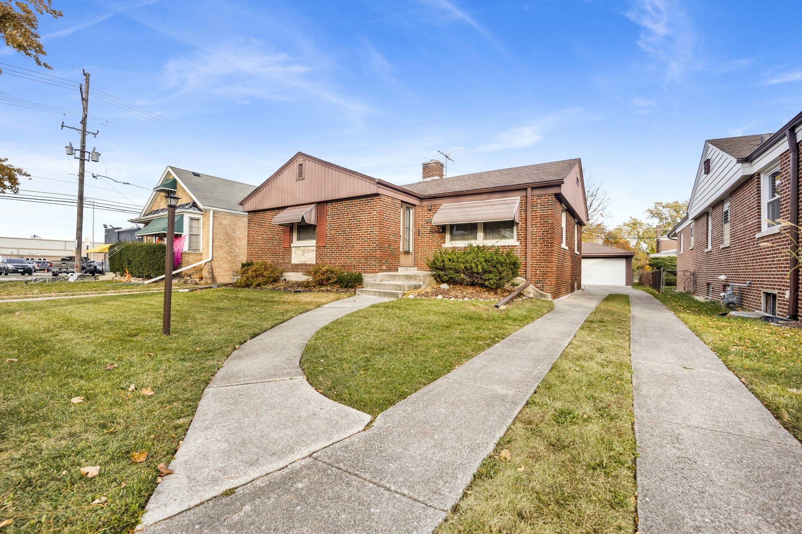 2223 South 7th Avenue North Riverside, IL 60546 - Photo 2 of 20 a view of a house with a swimming pool