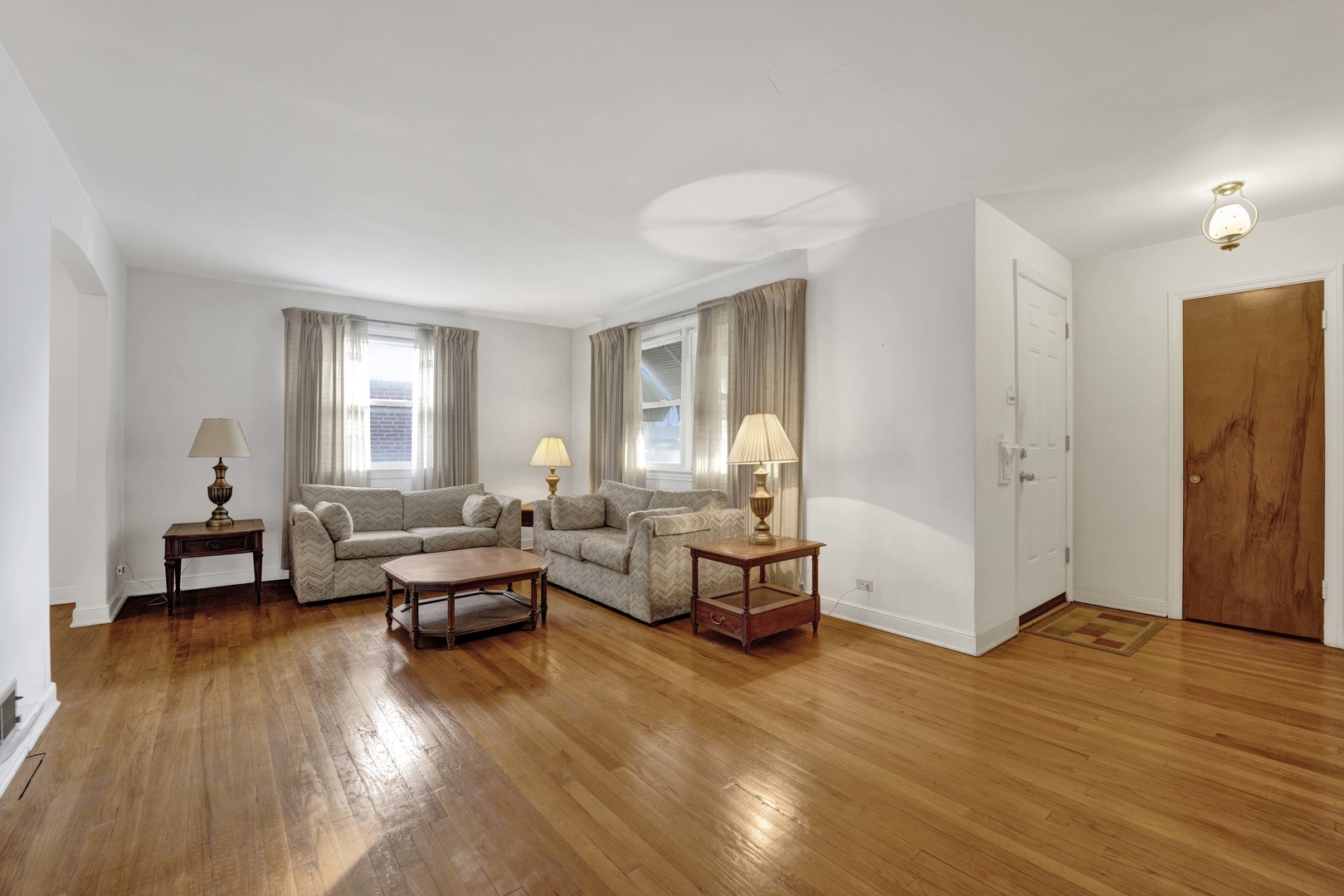 2223 South 7th Avenue North Riverside, IL 60546 - Photo 3 of 20 a living room with furniture and a wooden floor