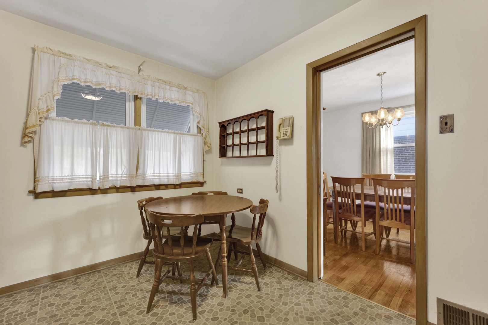 2223 South 7th Avenue North Riverside, IL 60546 - Photo 8 of 20 a dining room with furniture and window