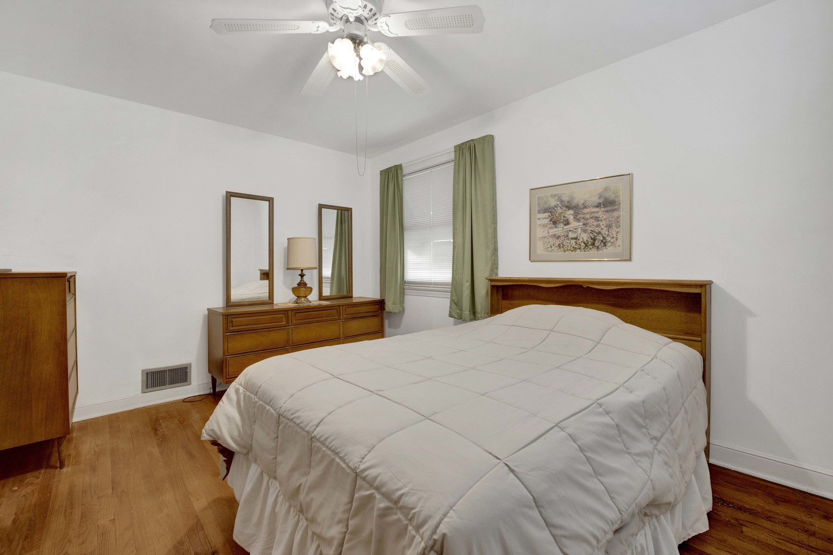 2223 South 7th Avenue North Riverside, IL 60546 - Photo 10 of 20 a bedroom with a bed and a chandelier