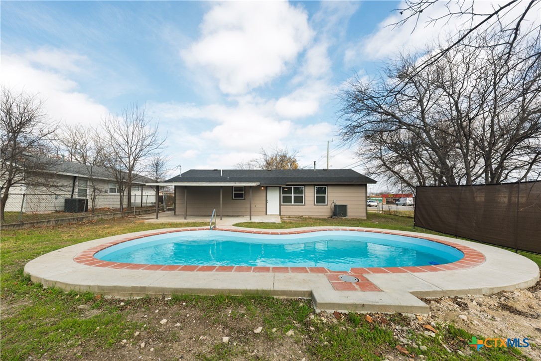 1200 Stephen Street Killeen, TX 76549 - Photo 19 of 22 a view of a house with pool and sitting area