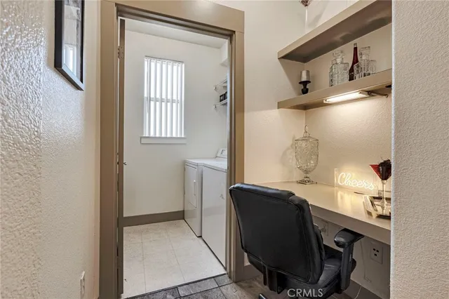 a view of workspace with window and mirror