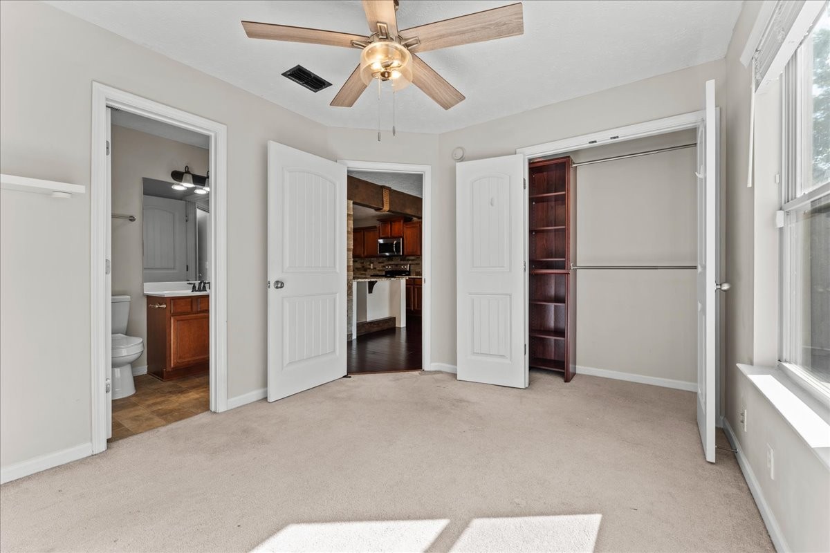 905 Thunder Gulch Way Murfreesboro, TN 37128 - Photo 14 of 27 a view of empty room with closet and ceiling fan