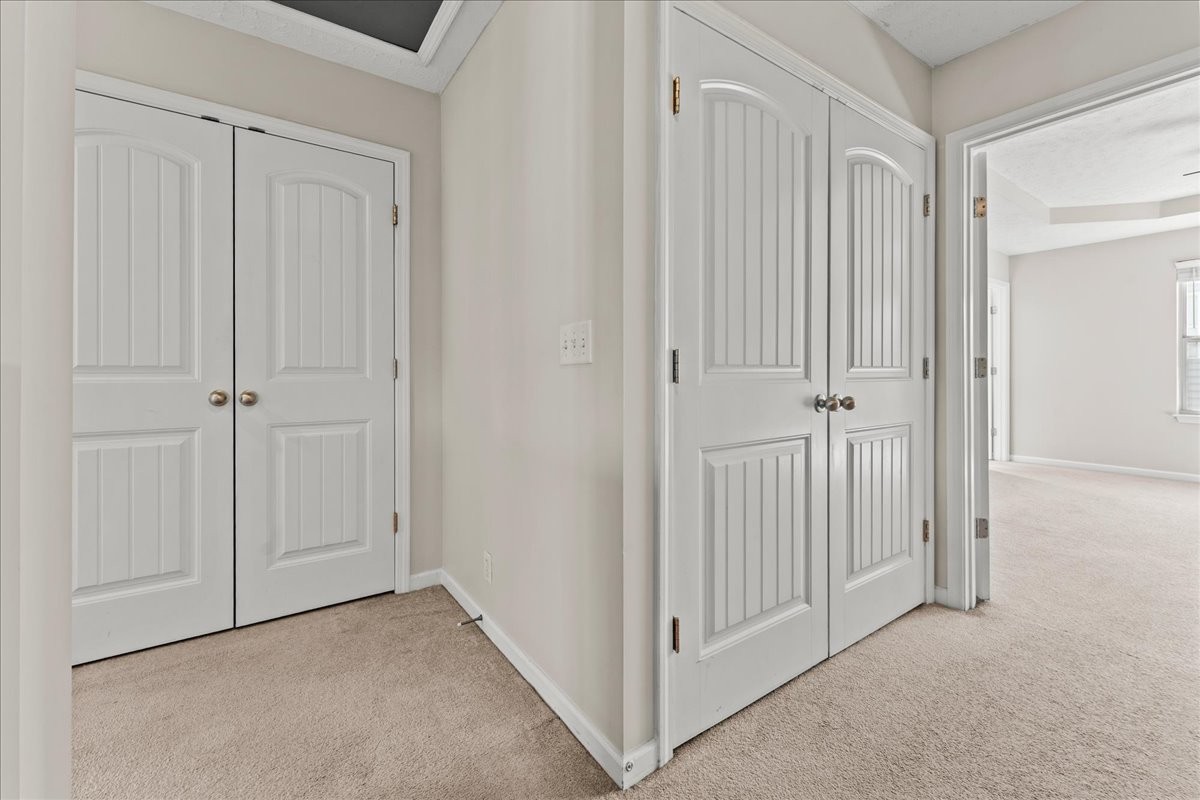 905 Thunder Gulch Way Murfreesboro, TN 37128 - Photo 16 of 27 a view of a livingroom with a wooden door
