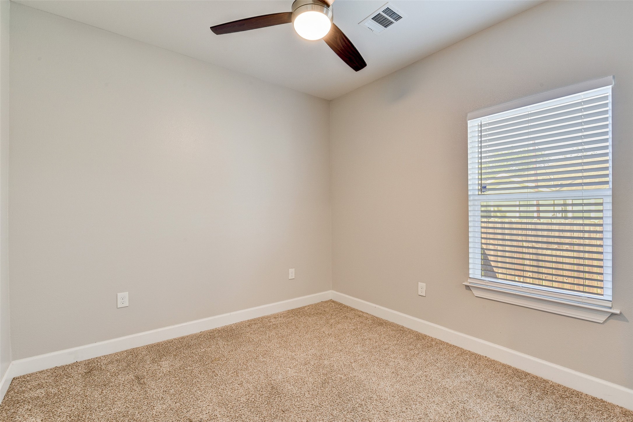 8617 Dosia Street Houston, TX 77051 - Photo 11 of 20 an empty room with a window