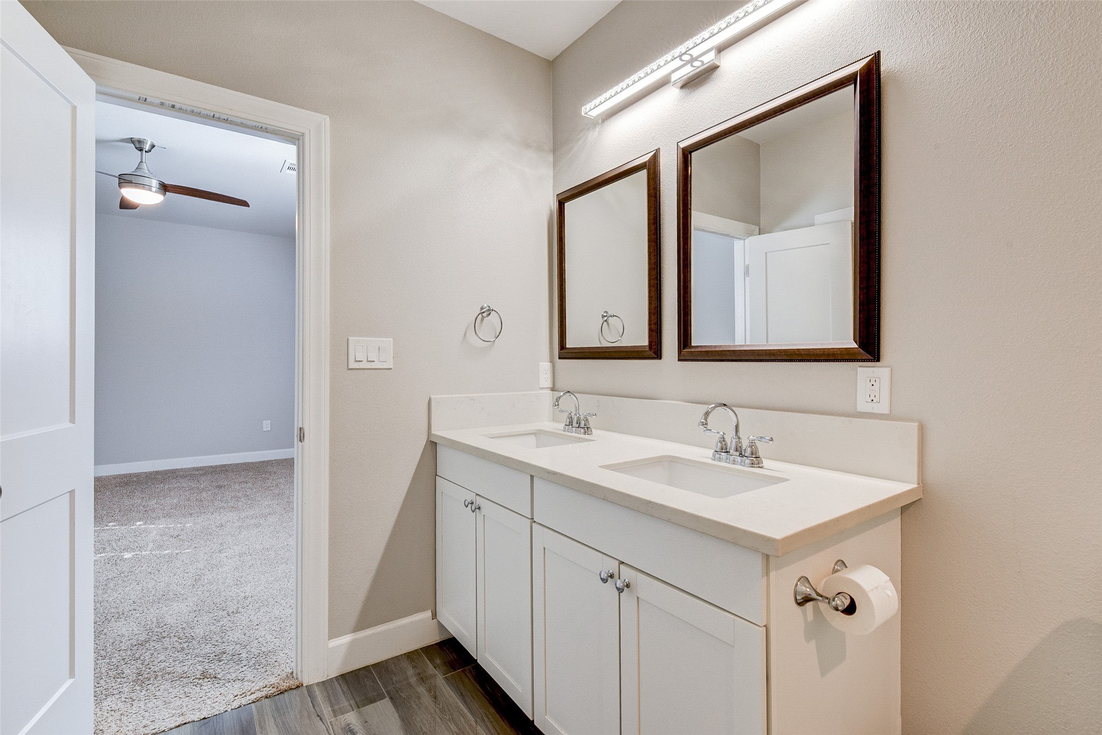 8617 Dosia Street Houston, TX 77051 - Photo 14 of 20 a bathroom with a double vanity sink mirror and
