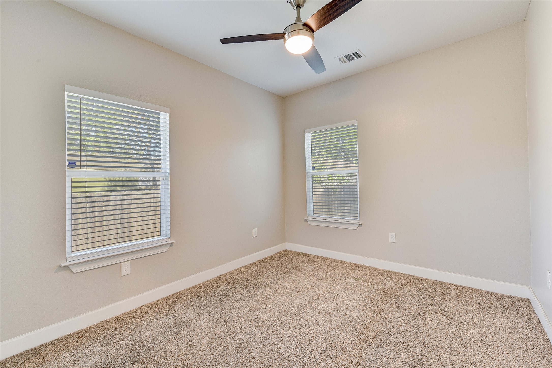 8617 Dosia Street Houston, TX 77051 - Photo 16 of 20 a view of an empty room with a window