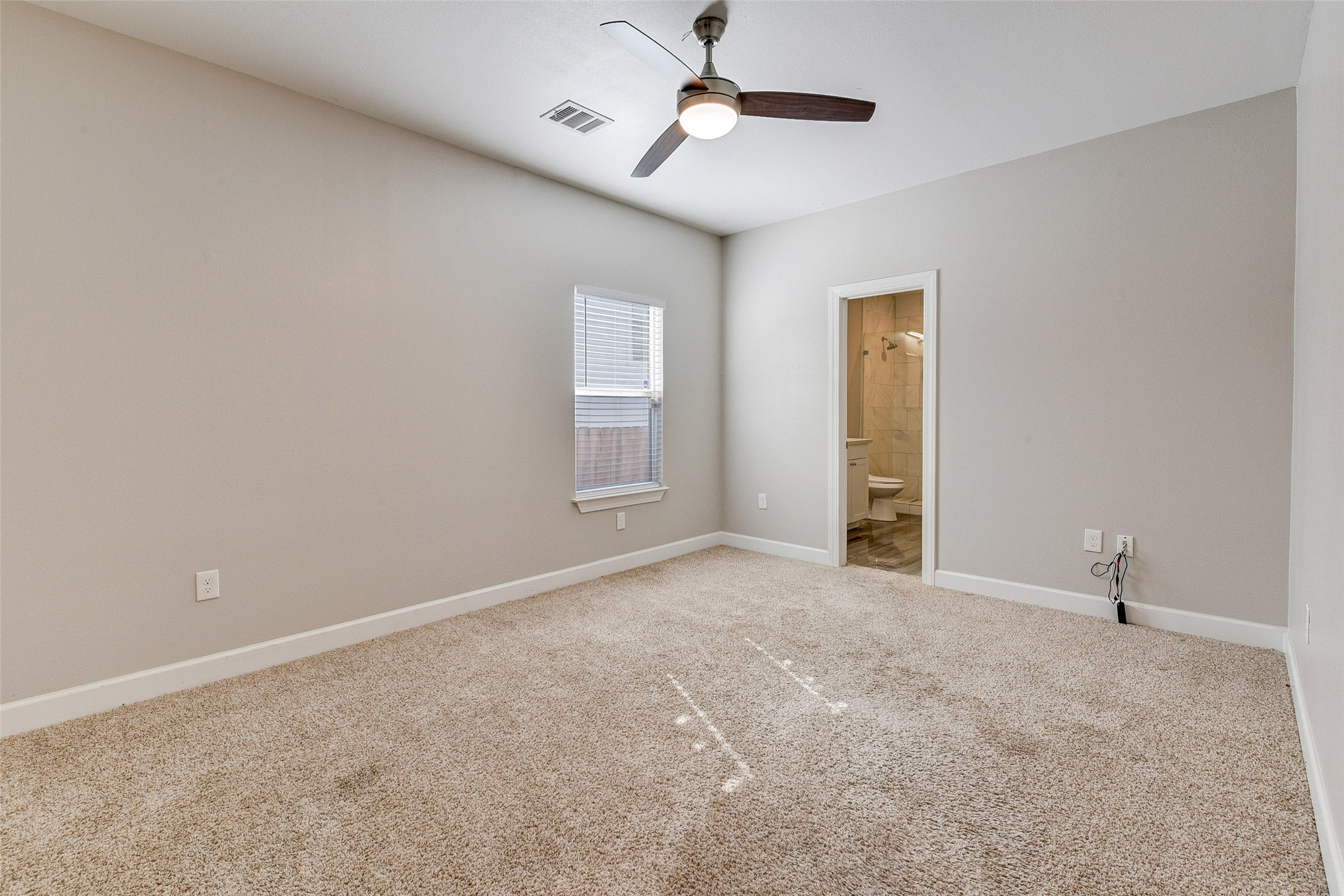 8617 Dosia Street Houston, TX 77051 - Photo 10 of 20 a view of an empty room with a window