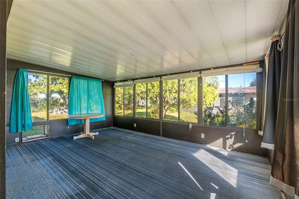 10085 Southeast 126th Place Belleview, FL 34420 - Photo 30 of 45 a living room with a large window