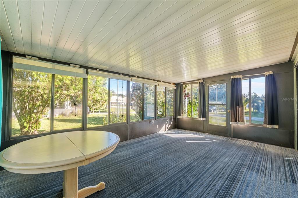 10085 Southeast 126th Place Belleview, FL 34420 - Photo 32 of 45 a view of a livingroom with a large window