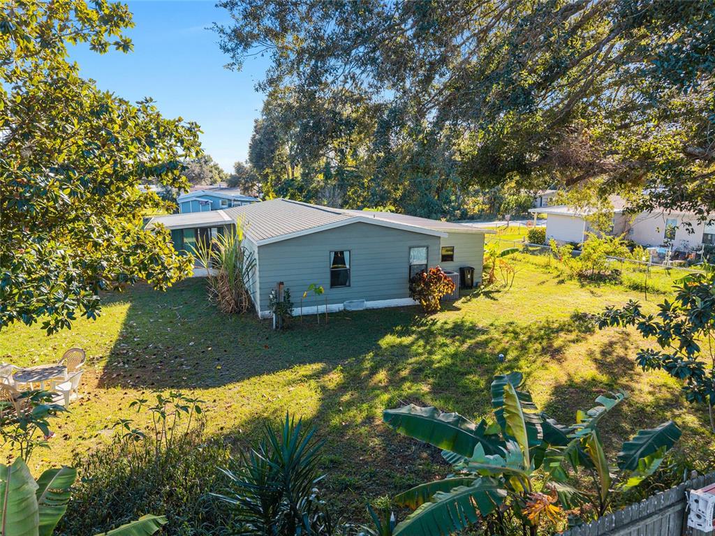 10085 Southeast 126th Place Belleview, FL 34420 - Photo 44 of 45 a view of a house with pool and sitting area