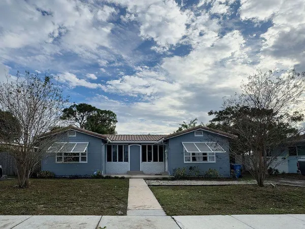 front view of house with a yard