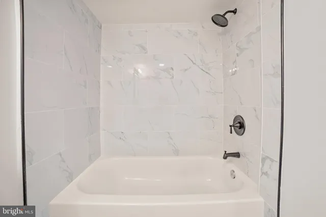 a bathroom with a bathtub