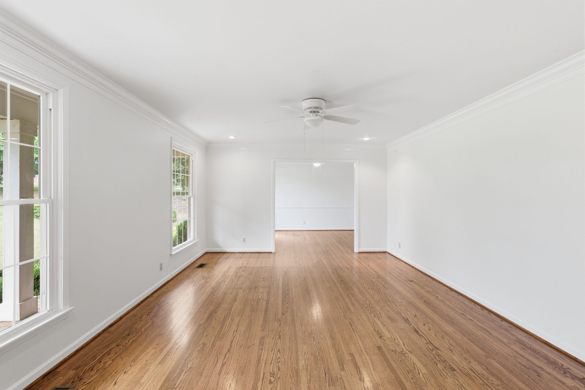 213 Rising Sun Lane Old Hickory, TN 37138 - Photo 5 of 37 a view of an empty room with wooden floor and a window