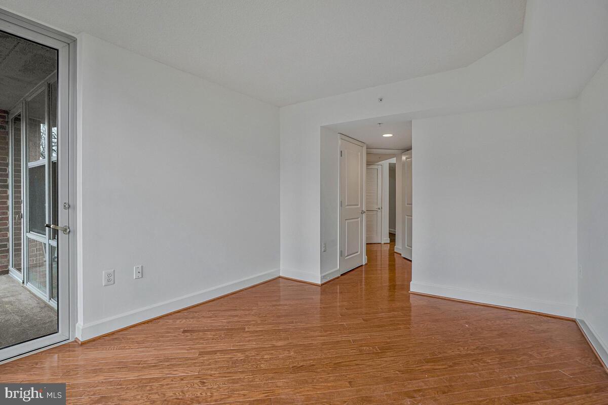 11800 Sunset Hills Road, Unit 514 Reston, VA 20190 - Photo 52 of 57 a view of empty room with wooden floor