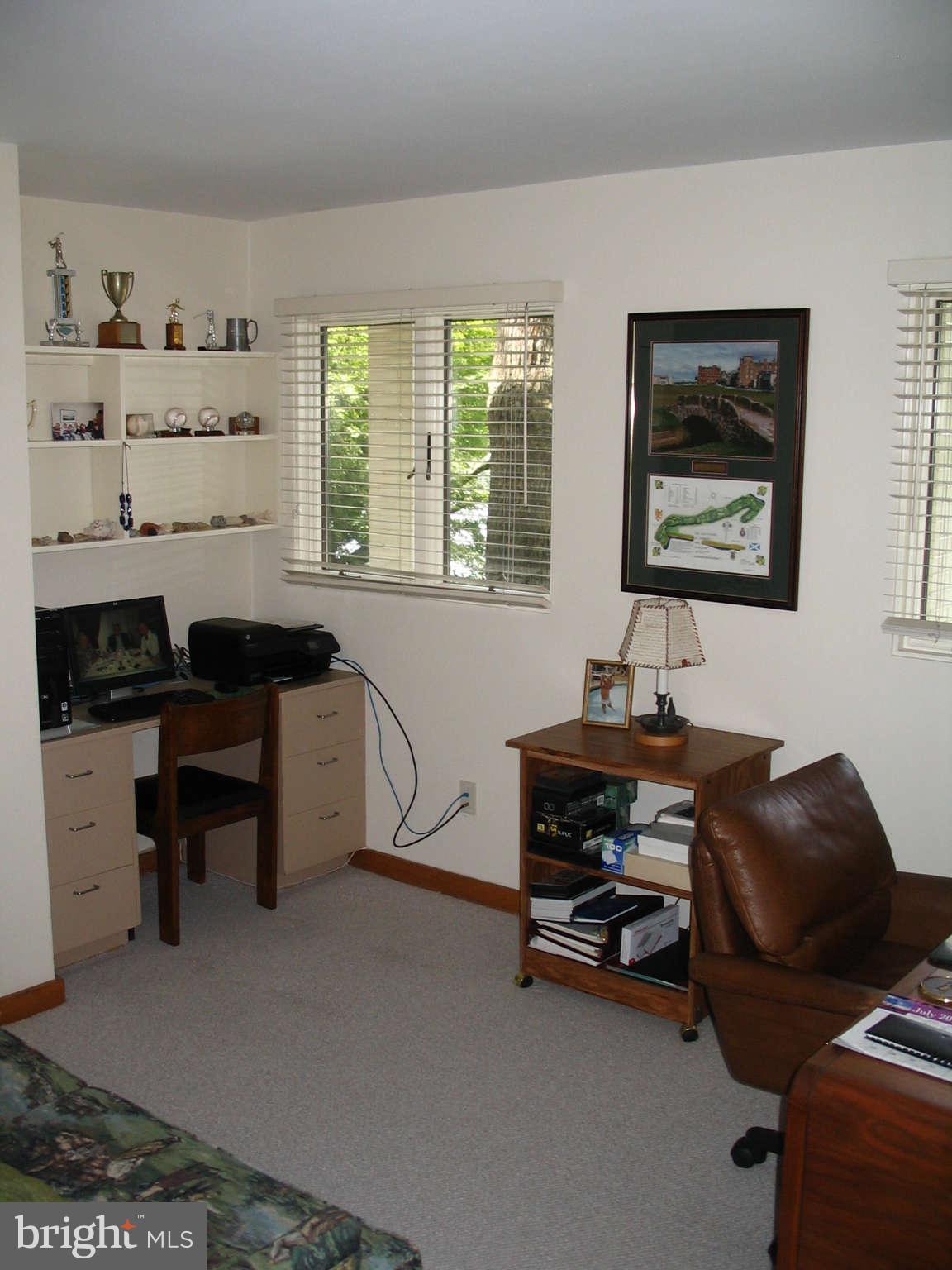 11312 South Shore Road Reston, VA 20190 - Photo 18 of 30 a living room with furniture and a window