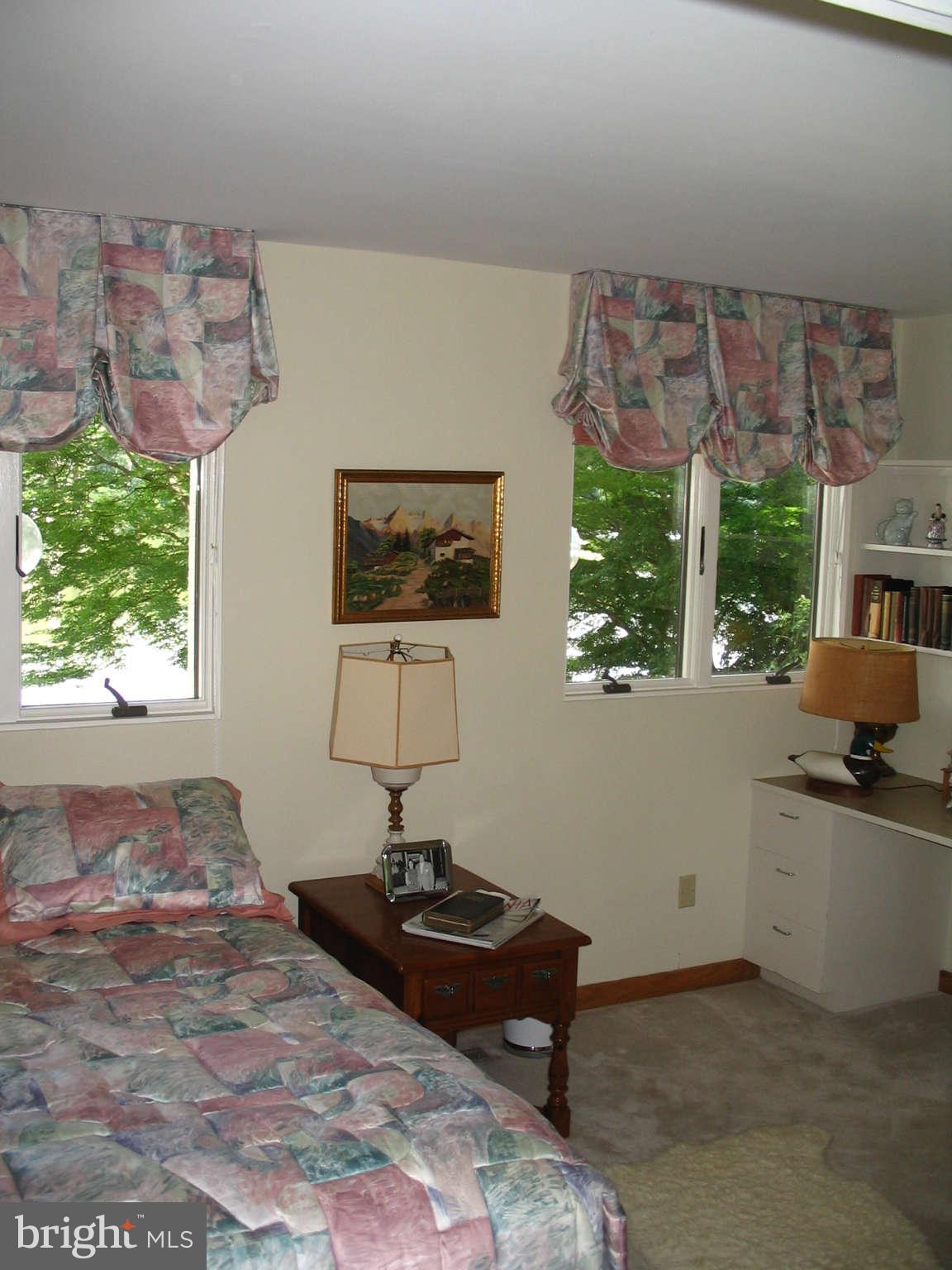 11312 South Shore Road Reston, VA 20190 - Photo 19 of 30 a living room with furniture and a large window