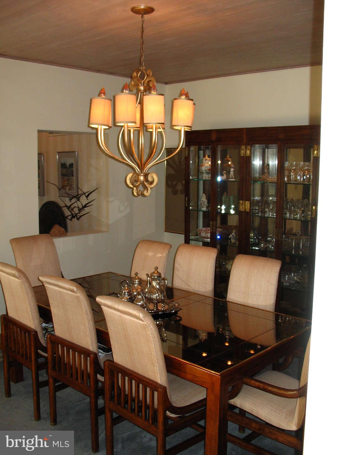 11312 South Shore Road Reston, VA 20190 - Photo 8 of 30 a dining room with furniture and window