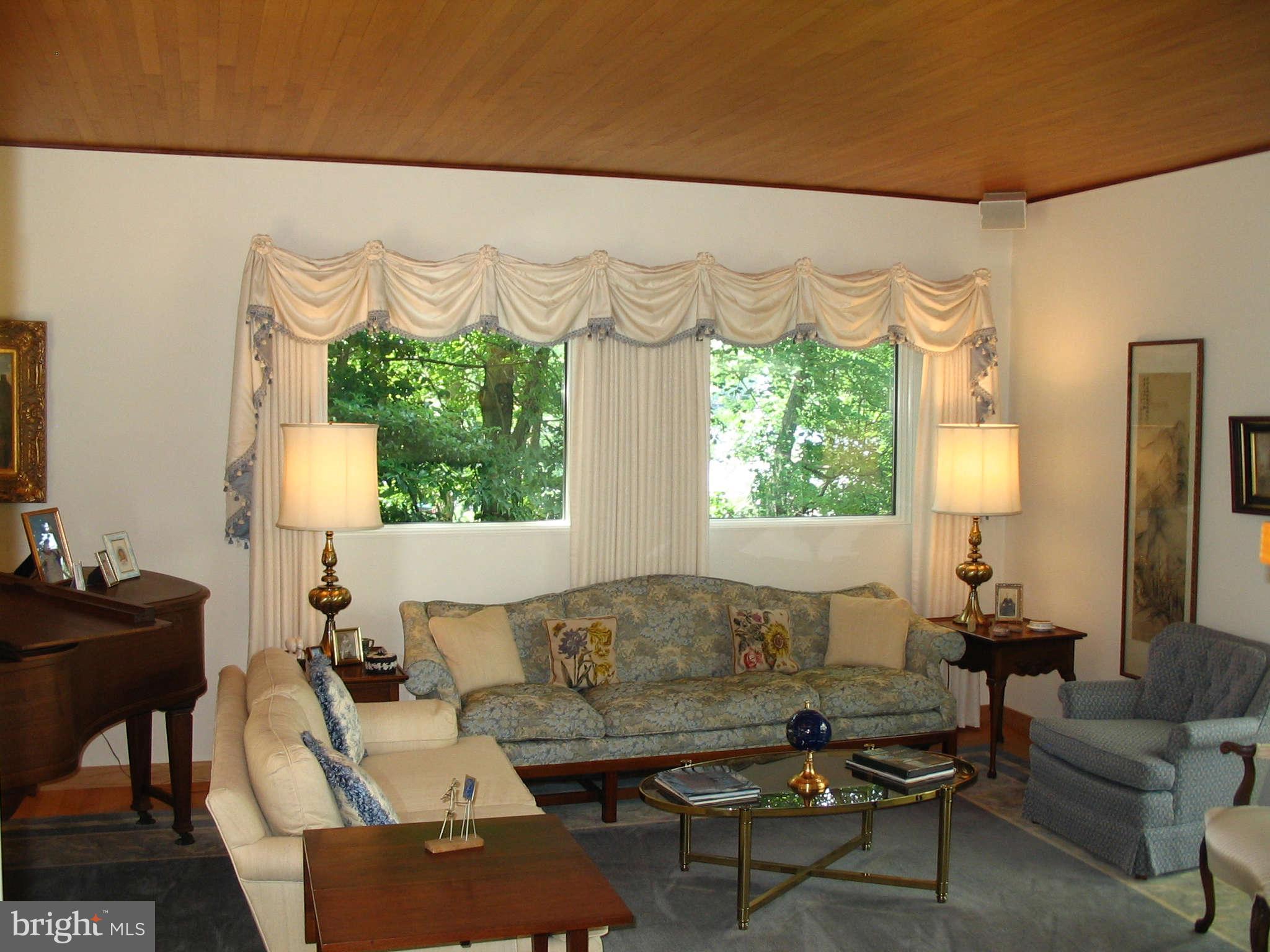 11312 South Shore Road Reston, VA 20190 - Photo 9 of 30 a living room with furniture and a large window