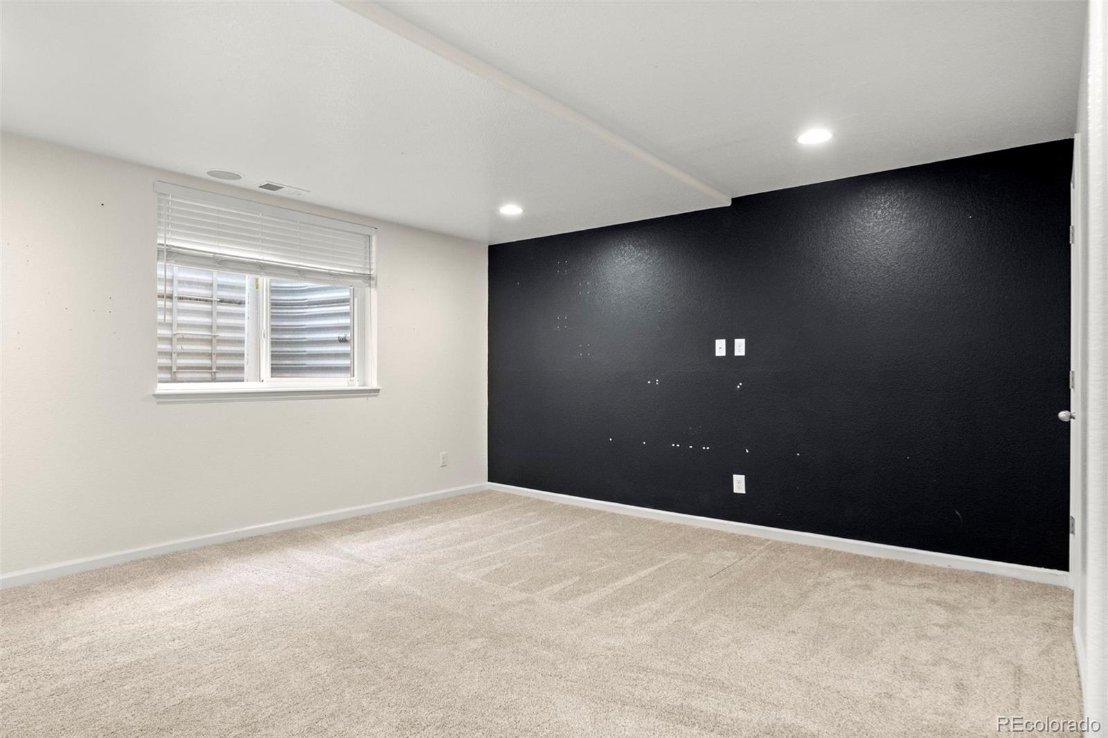 592 Brookhurst Avenue, Unit 26C Highlands Ranch, CO 80129 - Photo 16 of 30 a view of an empty room with a window