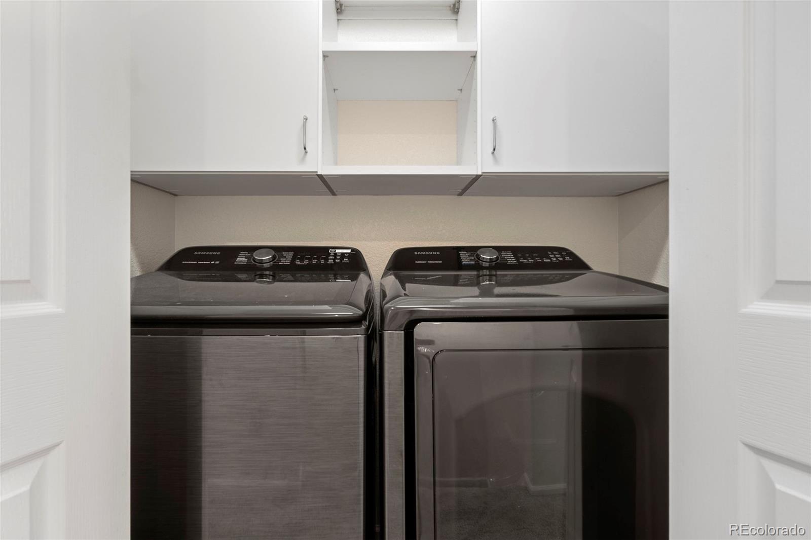 592 Brookhurst Avenue, Unit 26C Highlands Ranch, CO 80129 - Photo 19 of 30 a view of washer and dryer