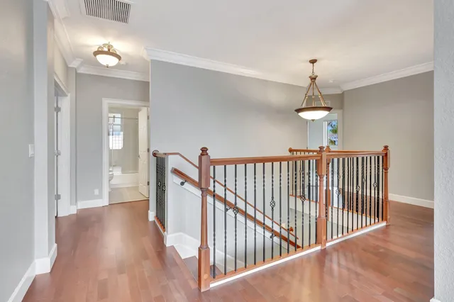 a view of a hallway view with staircase