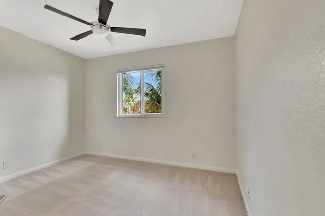 a view of a window in an empty room