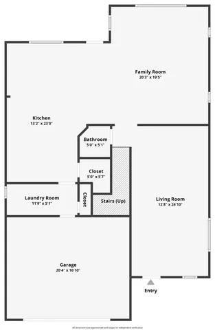 a front view of a house with a garden and plants