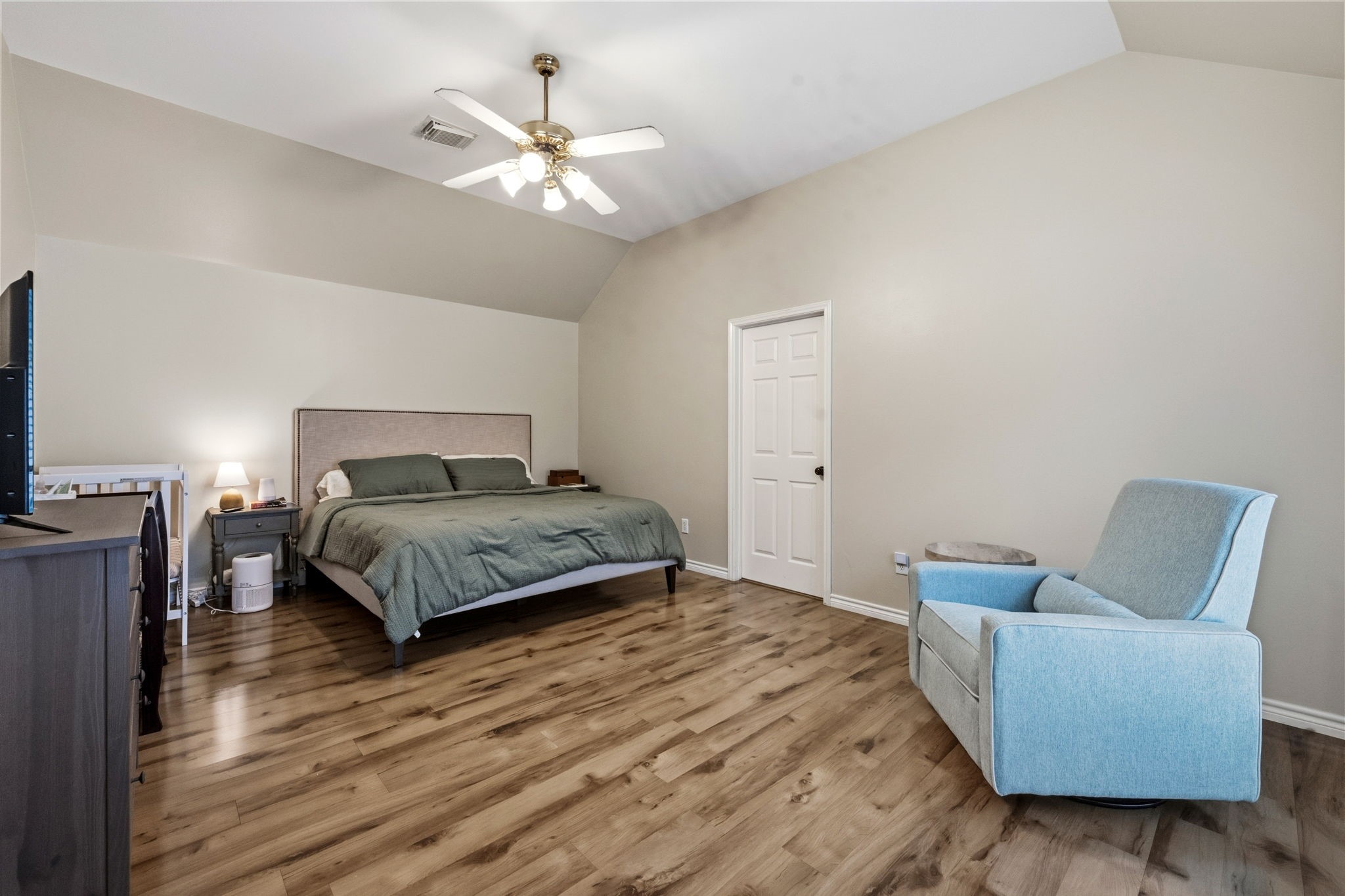 7514 Tumbling Road Humble, TX 77346 - Photo 15 of 28 a bedroom with a bed and a couch