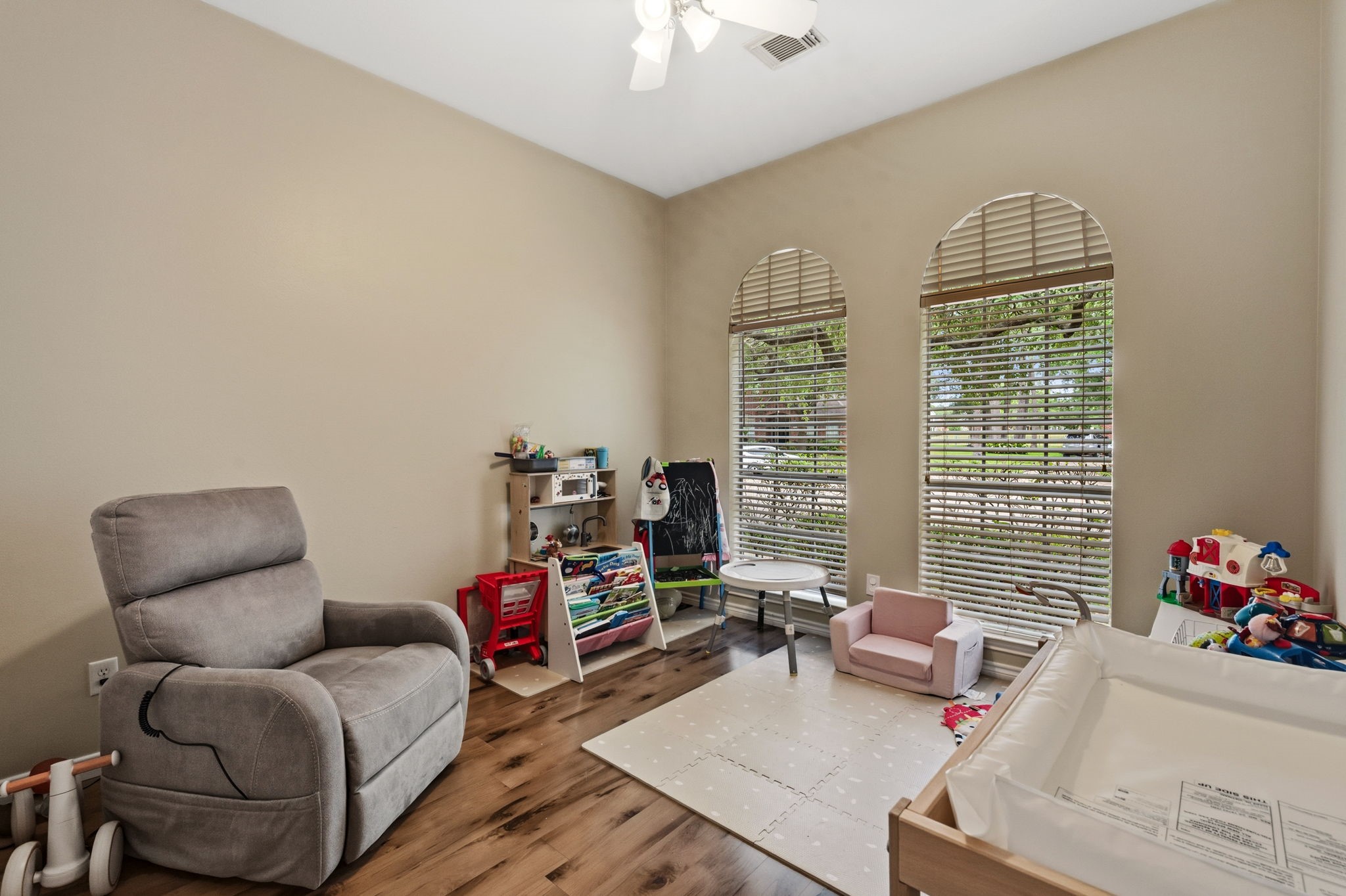 7514 Tumbling Road Humble, TX 77346 - Photo 21 of 28 a living room with furniture and a window