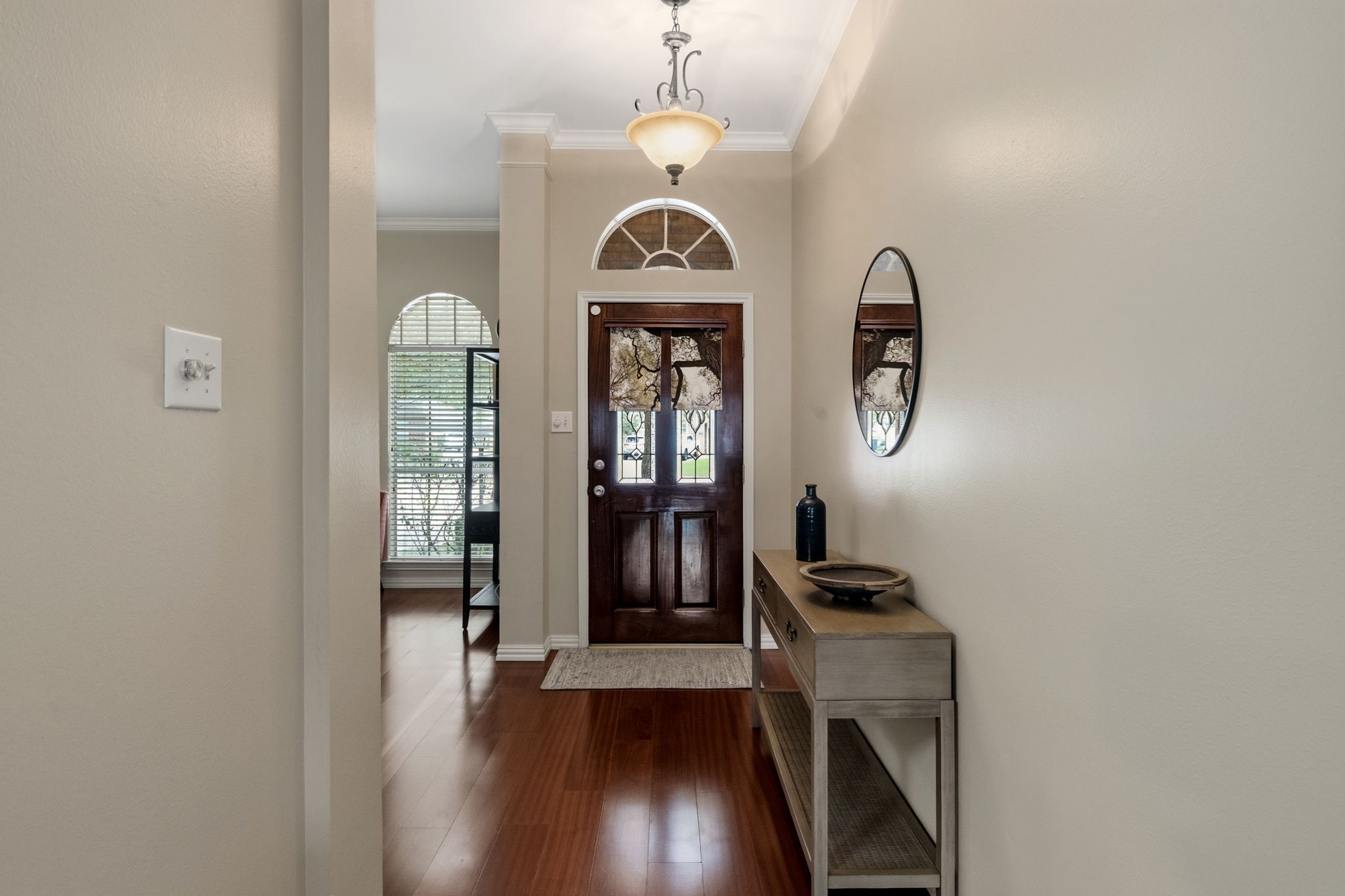 7514 Tumbling Road Humble, TX 77346 - Photo 3 of 28 a view of a entryway with wooden floor
