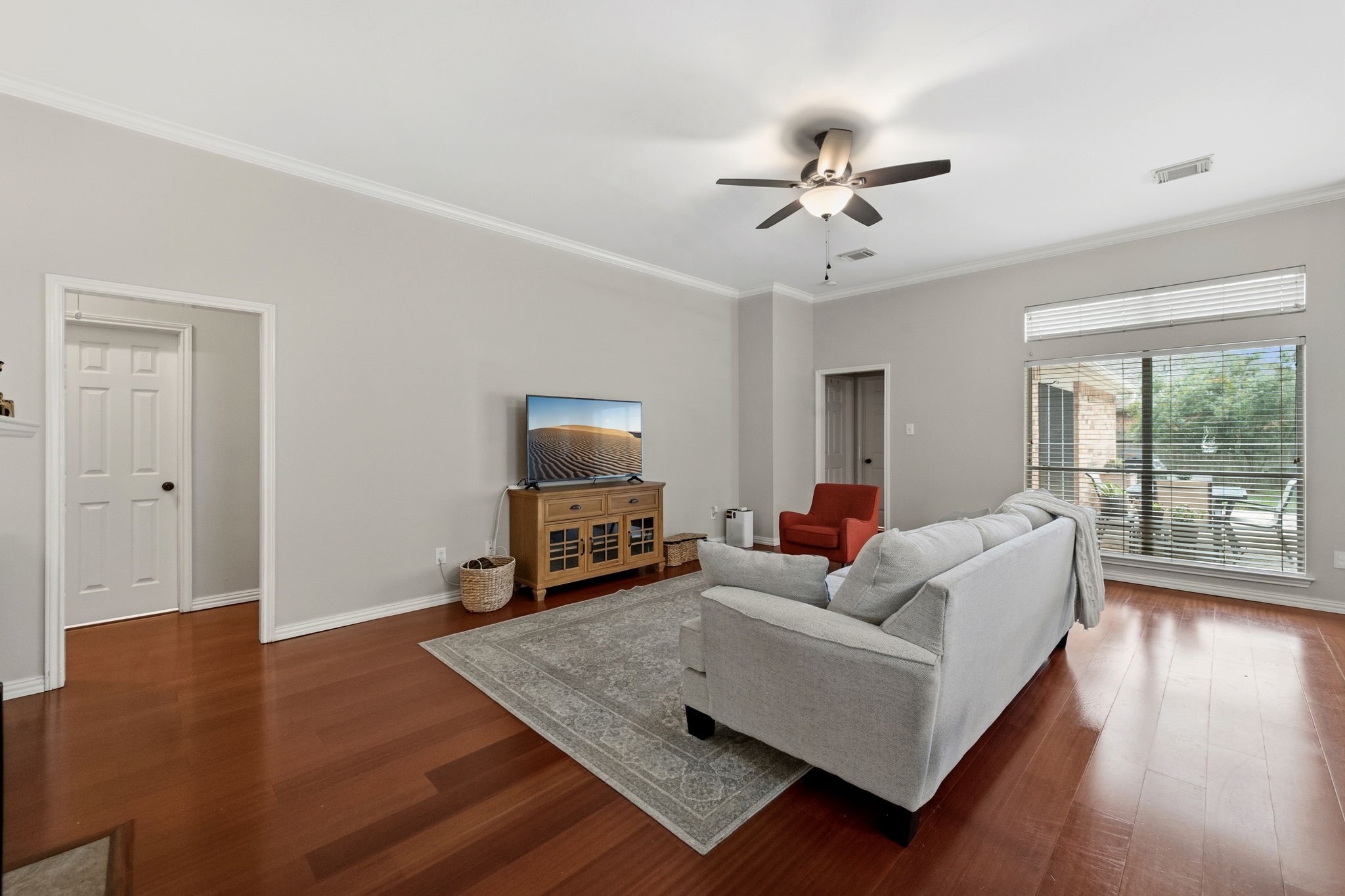 7514 Tumbling Road Humble, TX 77346 - Photo 5 of 28 a living room with furniture and a flat screen tv