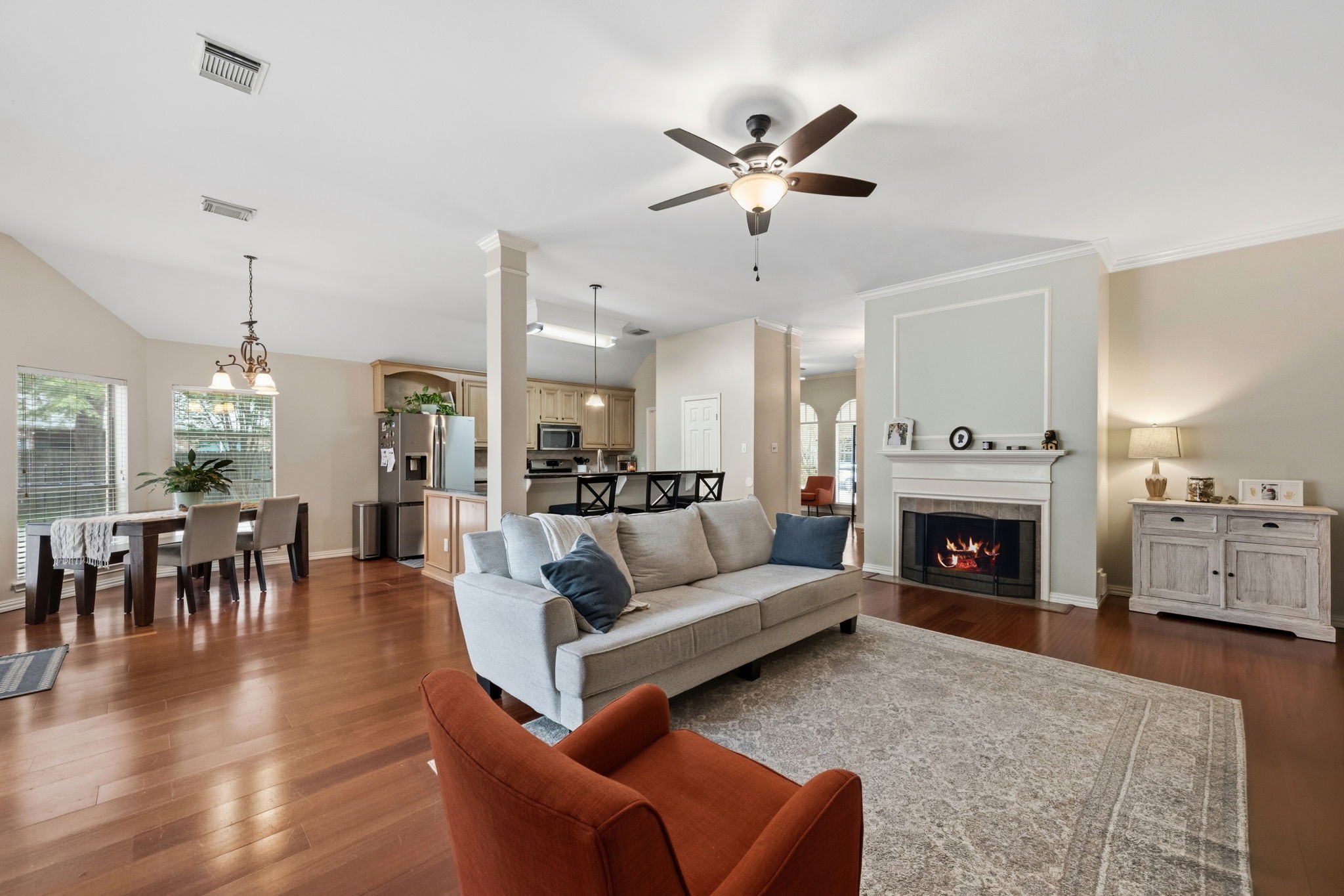 7514 Tumbling Road Humble, TX 77346 - Photo 7 of 28 a living room with furniture and a fireplace