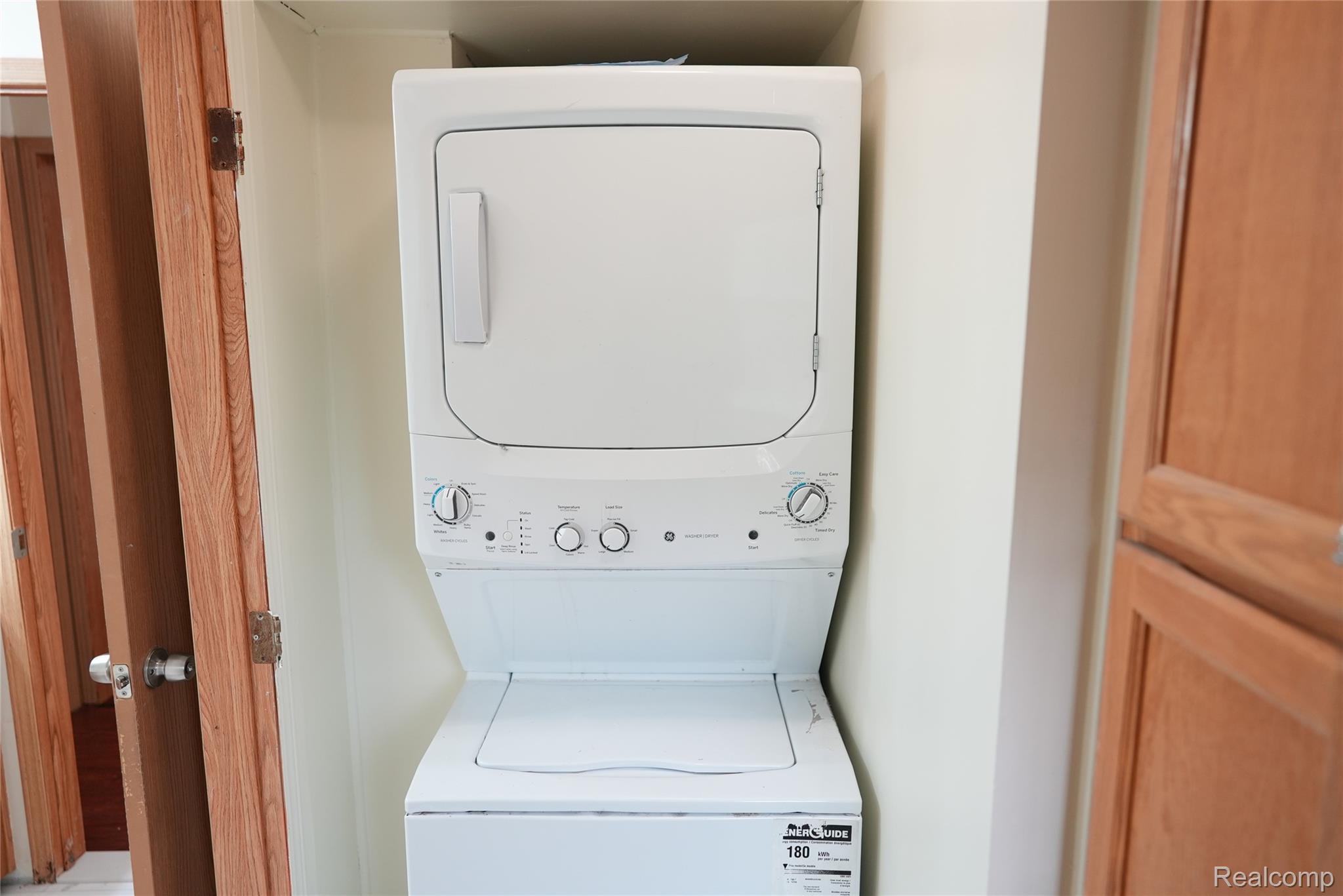 2018 John R Road Troy, MI 48083 - Photo 38 of 57 White stacked washer and dryer unit