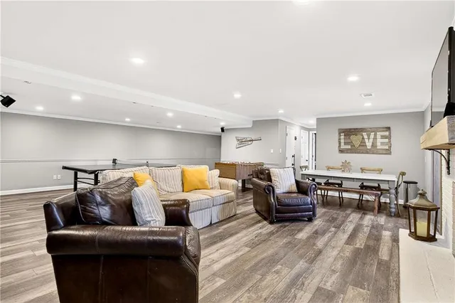 a living room with furniture and a table
