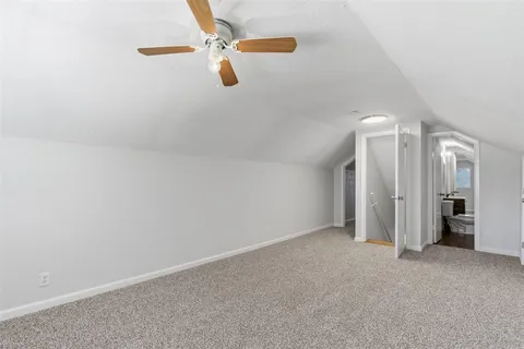 an empty room with closet area