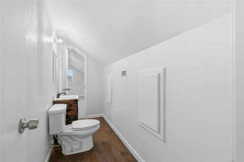 a large tree in front of a house