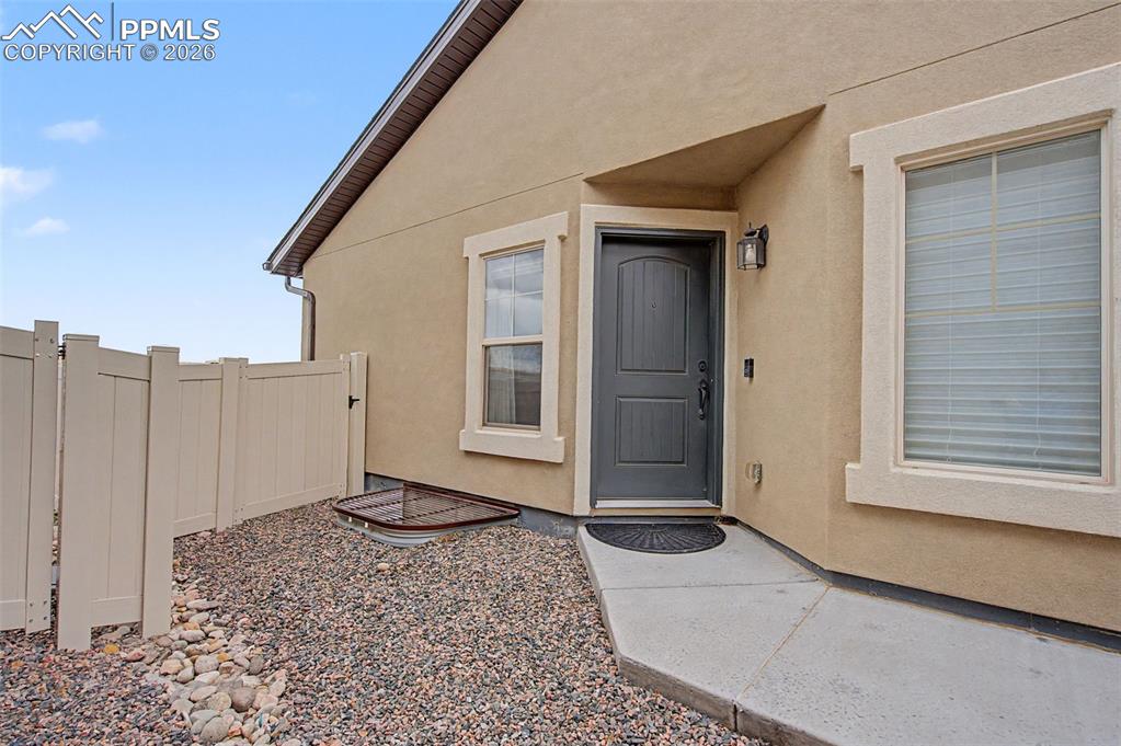 4467 Hessite Loop Colorado Springs, CO 80938 - Photo 36 of 37 a view of a house with a wooden bench