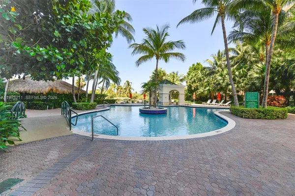 a view of a swimming pool with a patio