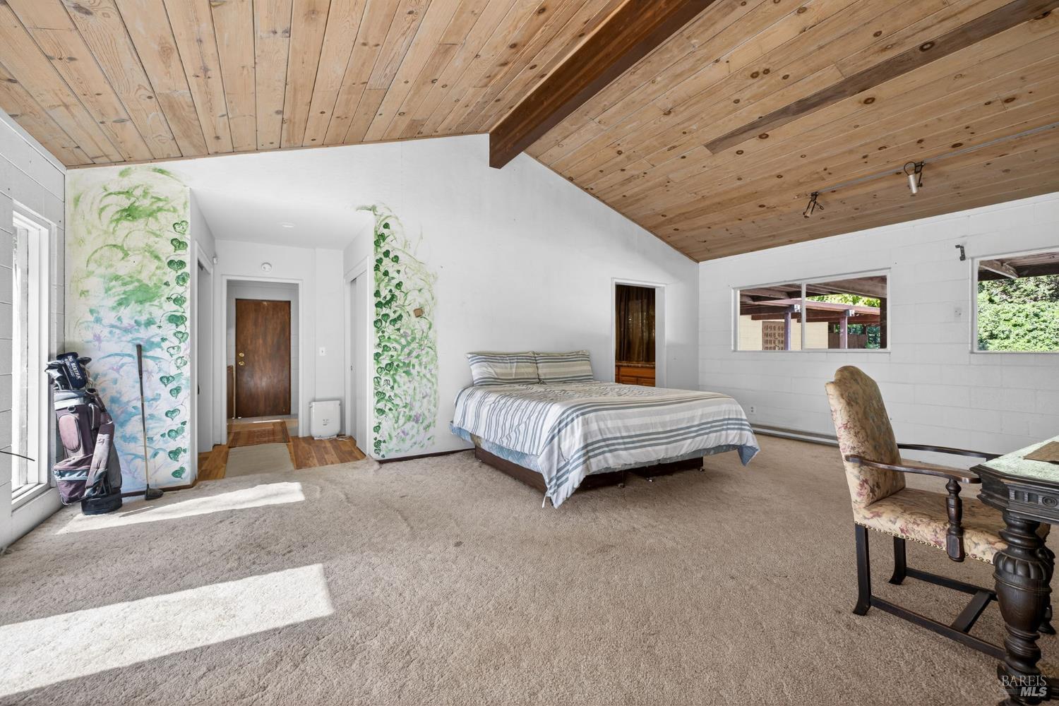 3320 Redwood Road Napa, CA 94558 - Photo 28 of 57 a bedroom with furniture and a window