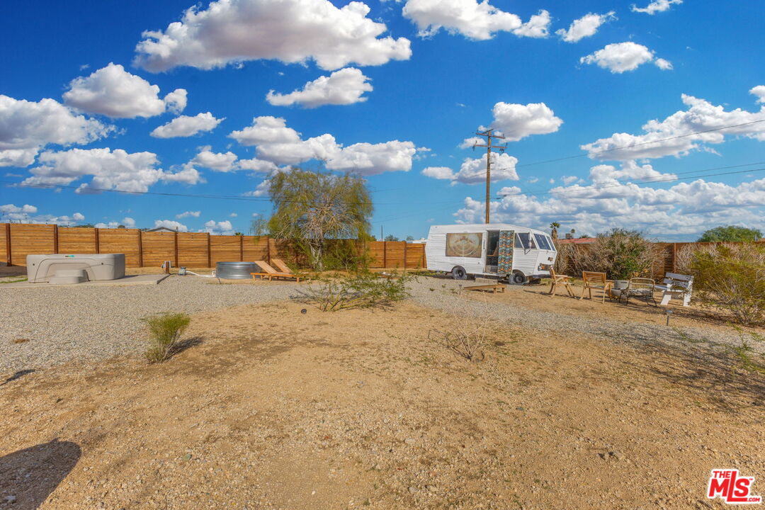 4789 Avenida Del Sol Joshua Tree, CA 92252 - Photo 28 of 37 a view of a house with snow on the roadside