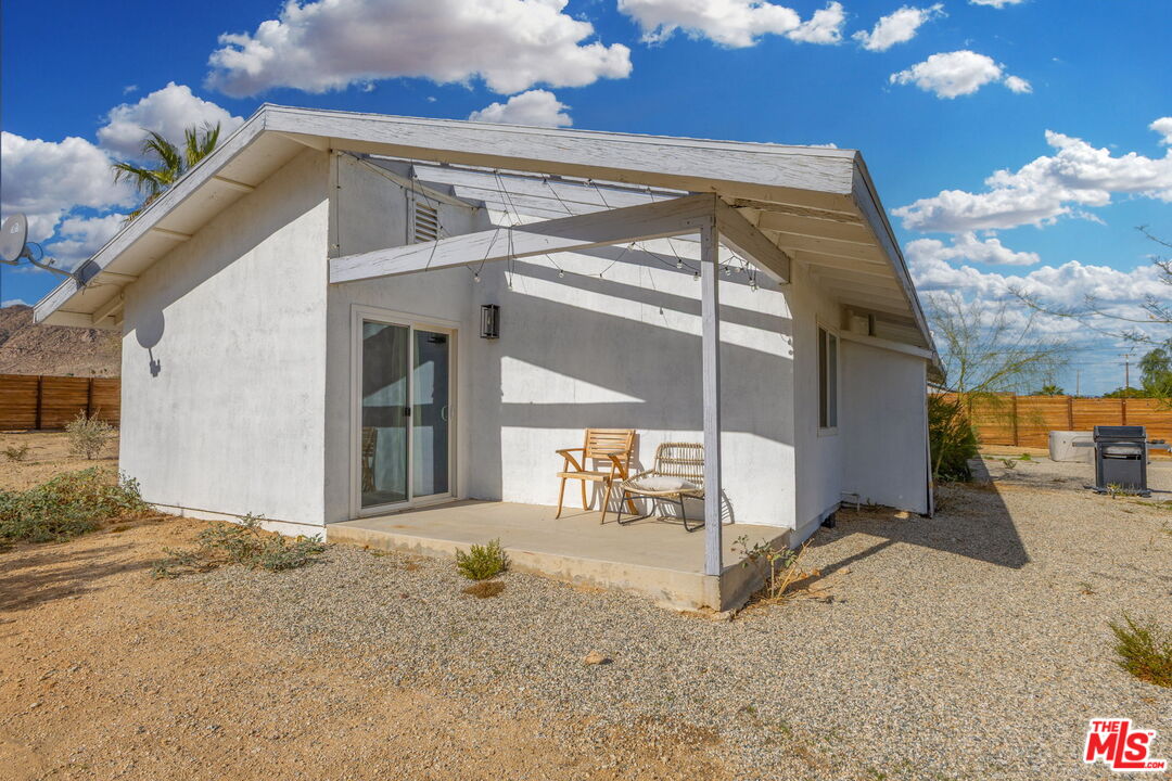 4789 Avenida Del Sol Joshua Tree, CA 92252 - Photo 35 of 37 a view of a house with basketball court