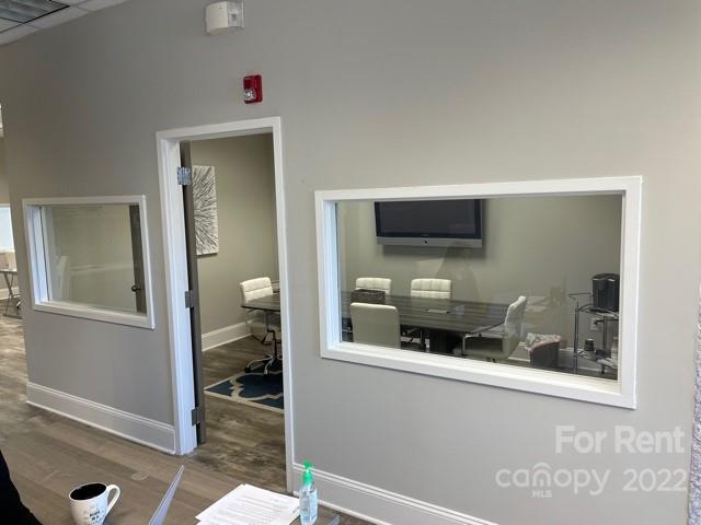 7510 Pineville-Matthews Road, Unit 14B Charlotte, NC 28226 - Photo 4 of 14 a kitchen with a sink and a mirror
