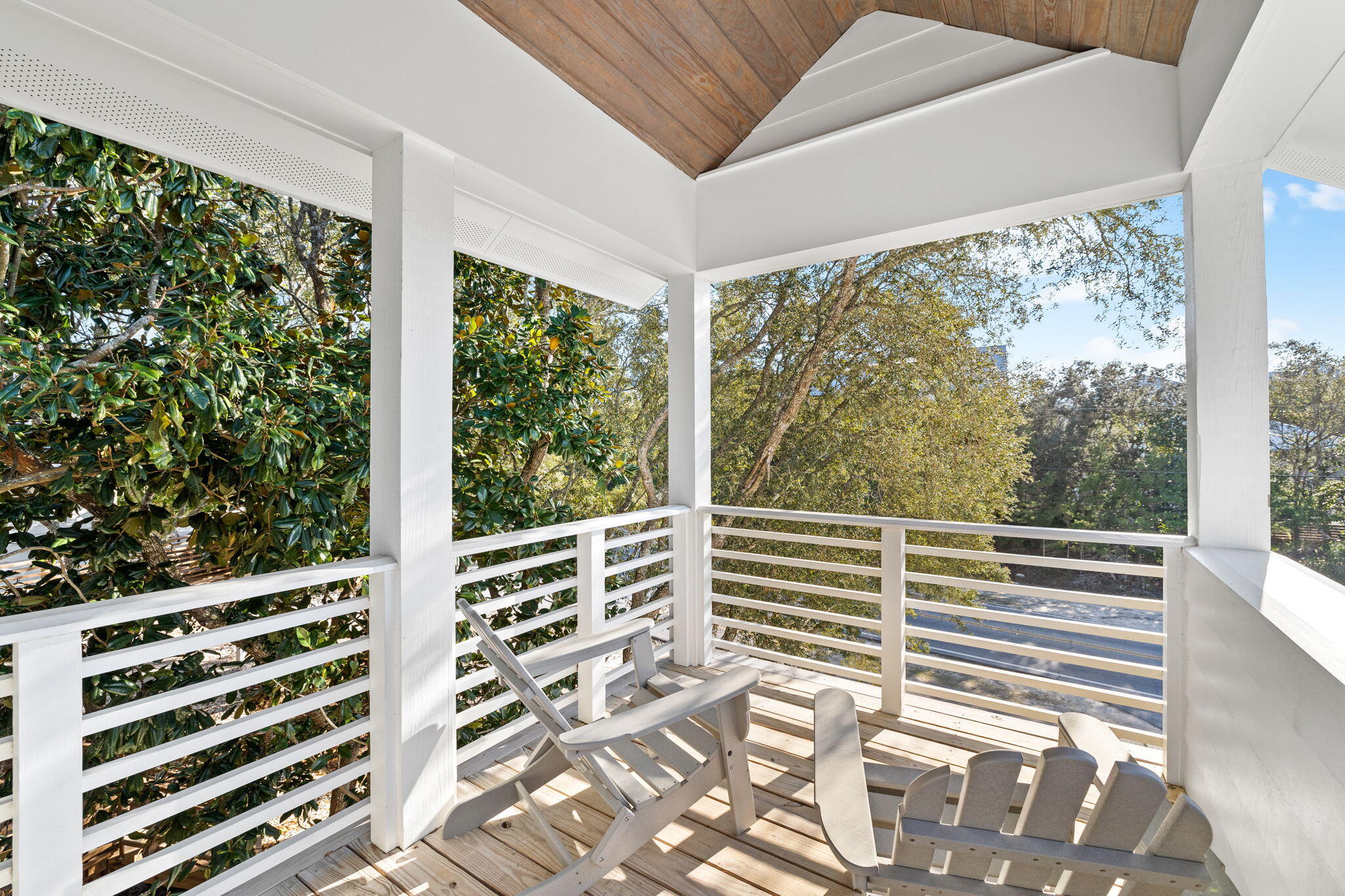 6312 West County Highway 30A Santa Rosa Beach, FL 32459 - Photo 14 of 58 a view of a room with wooden floor and windows