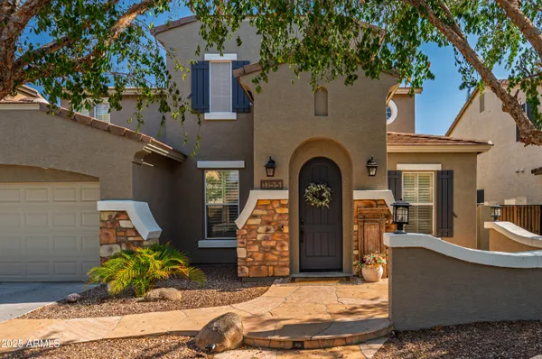 a front view of house with outdoor space