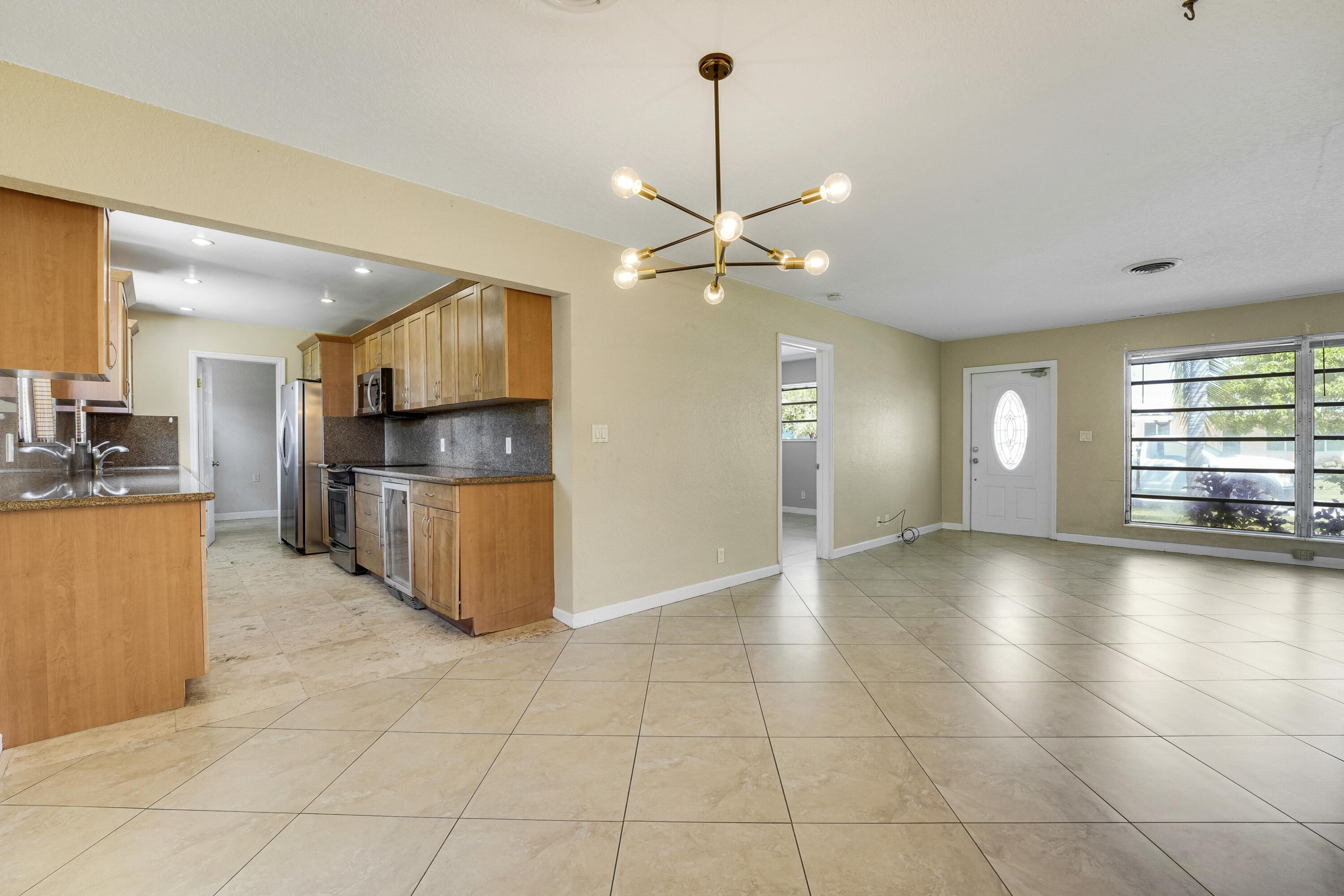 20 Willow Road Tequesta, FL 33469 - Photo 19 of 43 a view of a kitchen with a stove cabinets and a kitchen