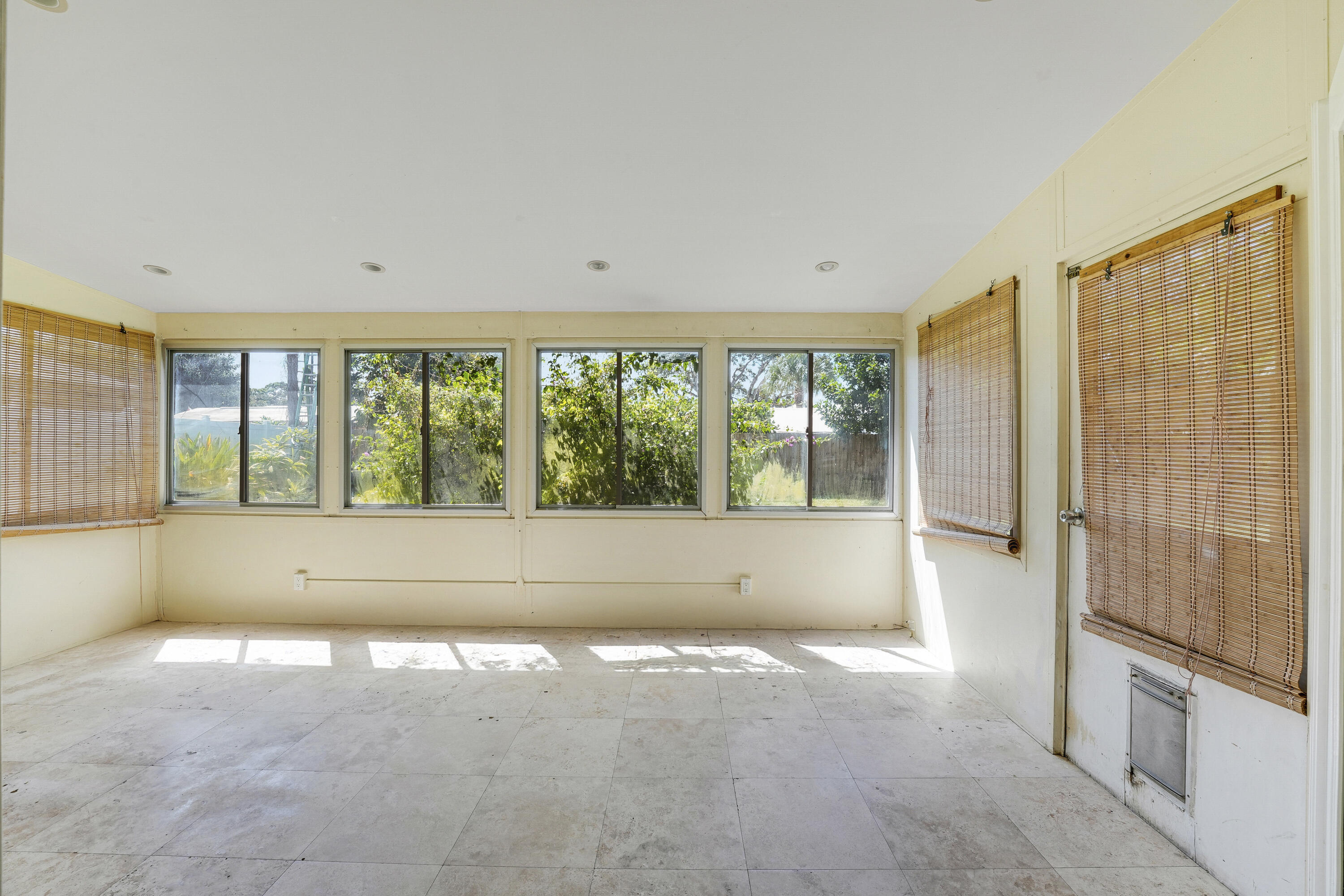 20 Willow Road Tequesta, FL 33469 - Photo 32 of 43 a view of an empty room with a window