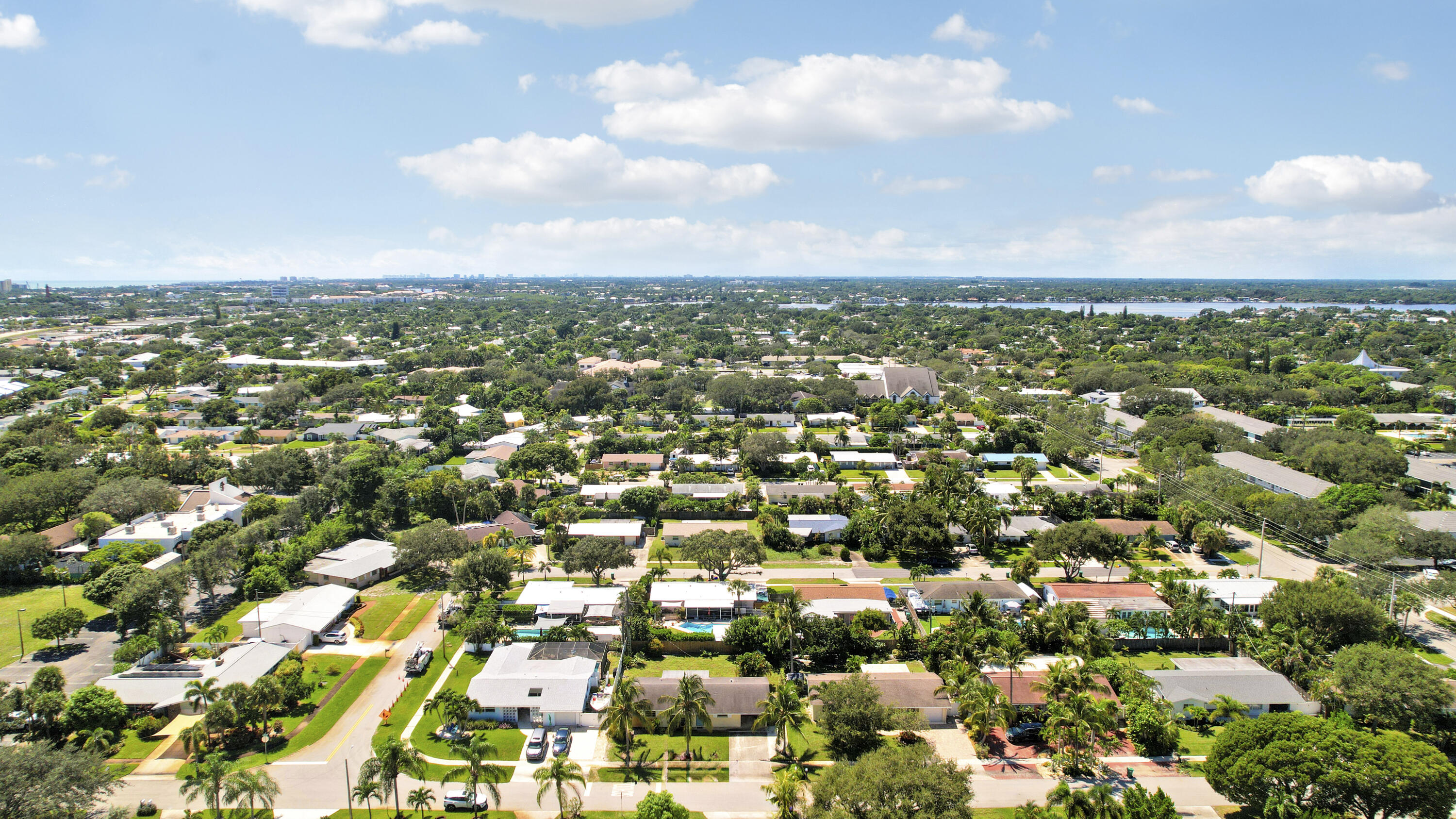 20 Willow Road Tequesta, FL 33469 - Photo 6 of 43 an aerial view of residential houses with city view