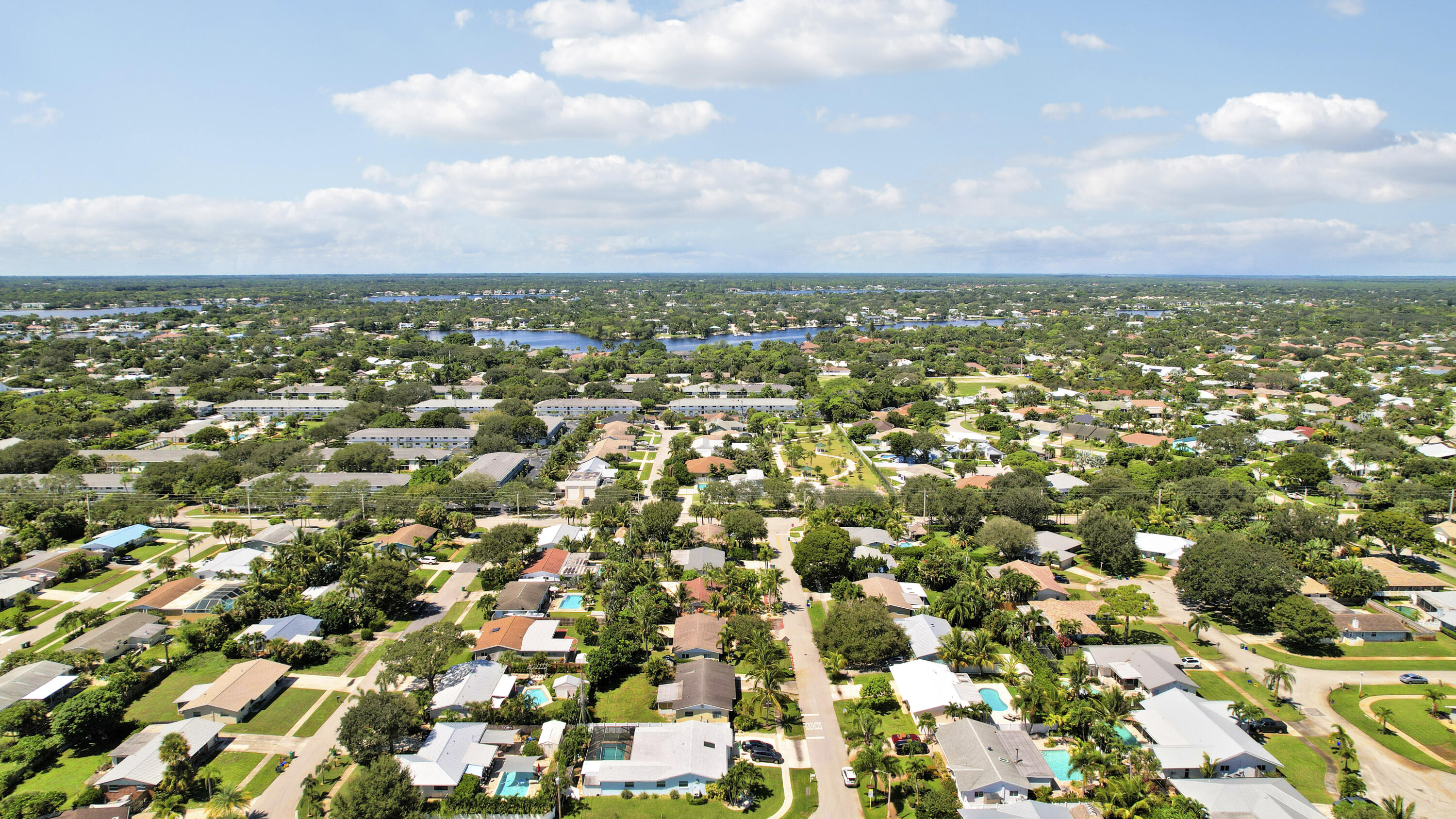 20 Willow Road Tequesta, FL 33469 - Photo 8 of 43 an aerial view of residential houses with city view