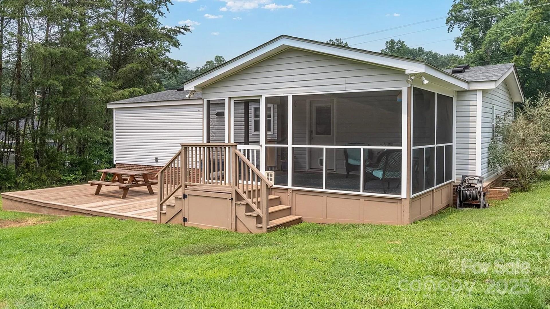 4220 Mt Beulah Road Maiden, NC 28650 - Photo 3 of 13 a view of a house with a yard and sitting area
